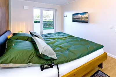 Ein Bett oder Betten in einem Zimmer der Unterkunft Kapitän Alexander, KA44