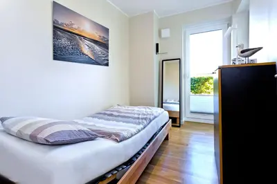 Ein Bett oder Betten in einem Zimmer der Unterkunft Kapitän Alexander, KA44