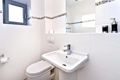 Ein Badezimmer in der Unterkunft Residenz am Yachthafen, RY15