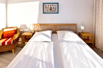 Ein Bett oder Betten in einem Zimmer der Unterkunft Residenz am Yachthafen, RY15