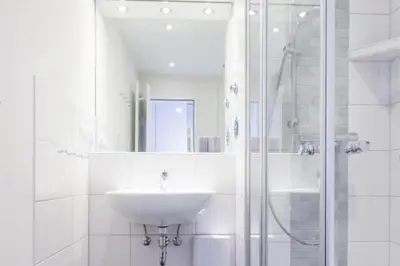 Ein Badezimmer in der Unterkunft Hohe Worth, H303