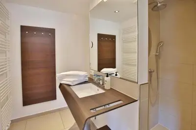 Ein Badezimmer in der Unterkunft Duhner Strandhus, S201