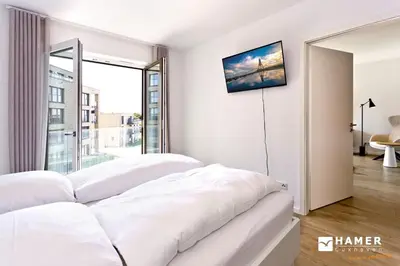 Ein Bett oder Betten in einem Zimmer der Unterkunft Duhner Spitze, DS54