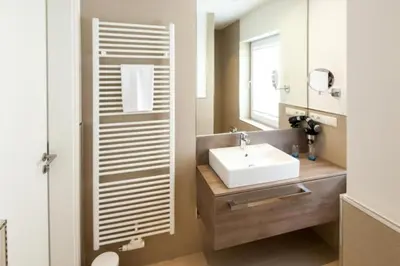 Ein Badezimmer in der Unterkunft Duhner Brandung, B6