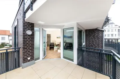 Ein Balkon oder eine Terrasse in der Unterkunft Duhner Brandung, B6