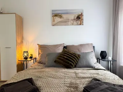 Ein Bett oder Betten in einem Zimmer der Unterkunft Apartments Brunsbüttel