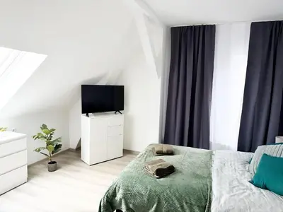 Ein Bett oder Betten in einem Zimmer der Unterkunft Apartments Brunsbüttel