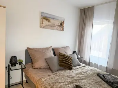Ein Bett oder Betten in einem Zimmer der Unterkunft Apartments Brunsbüttel