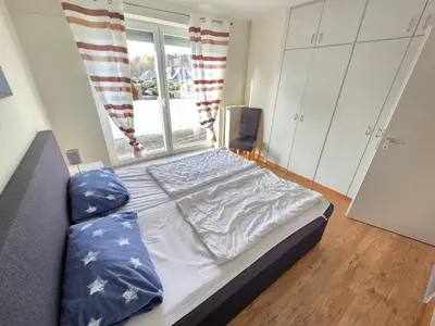 Ein Bett oder Betten in einem Zimmer der Unterkunft Hamburger Straße 20 Wohnung 11 Lichtanker