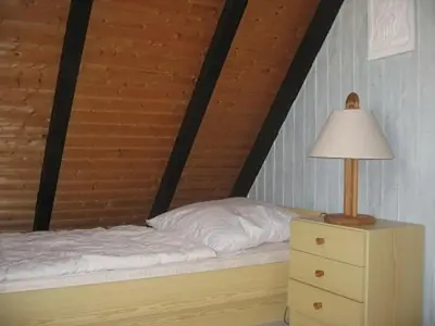Ein Bett oder Betten in einem Zimmer der Unterkunft Frische Brise