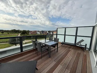 Ein Balkon oder eine Terrasse in der Unterkunft Haus Vogelsand, App 342