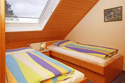 Ein Bett oder Betten in einem Zimmer der Unterkunft Haus Apart, Whg 3