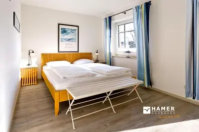 Ein Bett oder Betten in einem Zimmer der Unterkunft Am Seedeich 17, AS177