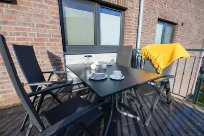 Ein Balkon oder eine Terrasse in der Unterkunft Ferienwohnung 