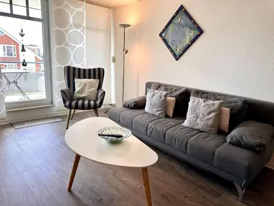 Ein Sitzbereich in der Unterkunft Ferienwohnung De Klüver