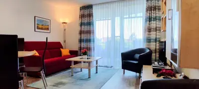 Ein Sitzbereich in der Unterkunft Ferienwohnung De Brecker