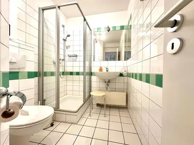Ein Badezimmer in der Unterkunft Ferienwohnung De Brecker