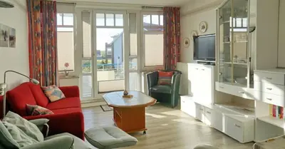 Ein Sitzbereich in der Unterkunft Ferienwohnung De Kiewitt 207