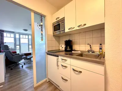 Küche/Küchenzeile in der Unterkunft Ferienwohnung De Kiewitt 207