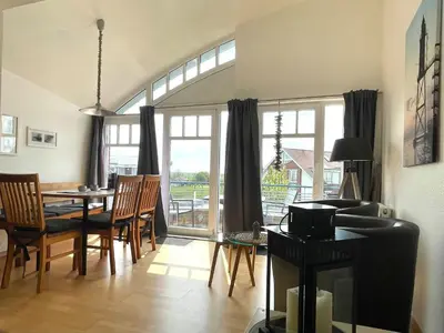 Ein Sitzbereich in der Unterkunft Ferienwohnung De Keel