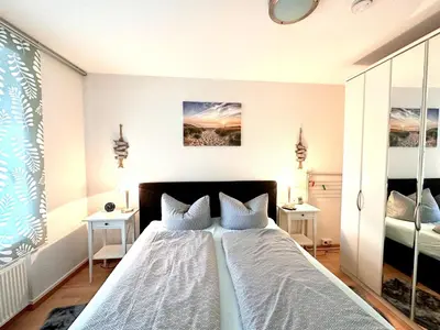 Ein Bett oder Betten in einem Zimmer der Unterkunft Ferienwohnung de Tietsnik