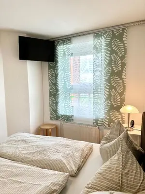 Ein Bett oder Betten in einem Zimmer der Unterkunft Ferienwohnung de Tietsnik