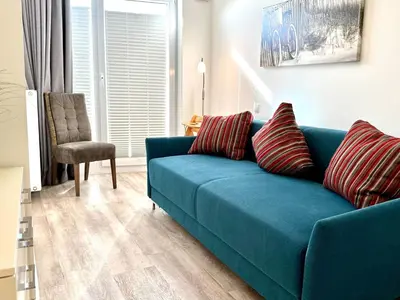 Ein Sitzbereich in der Unterkunft Ferienwohnung De Eller