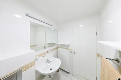 Ein Badezimmer in der Unterkunft Ferienwohnung De Üützepogg