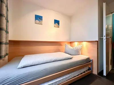 Ein Bett oder Betten in einem Zimmer der Unterkunft Ferienwohnung Suite de Svaan