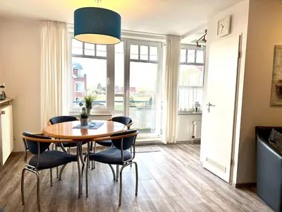 Ein Sitzbereich in der Unterkunft Ferienwohnung De Dwarslöper