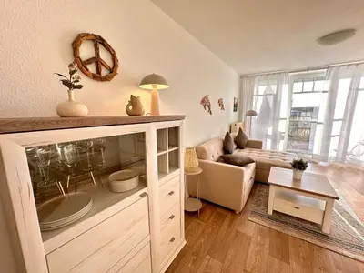 Ein Sitzbereich in der Unterkunft Ferienwohnung De Diek 103