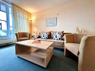 Ein Sitzbereich in der Unterkunft Ferienwohnung De Diek 105