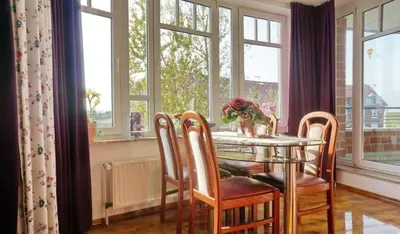 Ein Sitzbereich in der Unterkunft Ferienwohnung De Dörsch