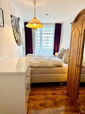 Ein Bett oder Betten in einem Zimmer der Unterkunft Ferienwohnung De Dörsch