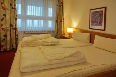 Ein Bett oder Betten in einem Zimmer der Unterkunft Ferienwohnung De Draggen