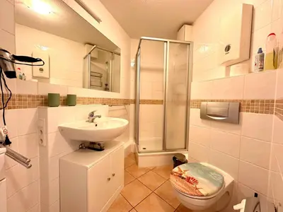 Ein Badezimmer in der Unterkunft Ferienwohnung De Lachmööv