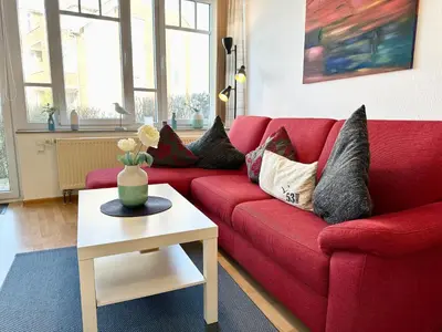 Ein Sitzbereich in der Unterkunft Ferienwohnung De Ligger