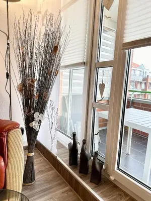 Ein Sitzbereich in der Unterkunft Ferienwohnung De Ööster