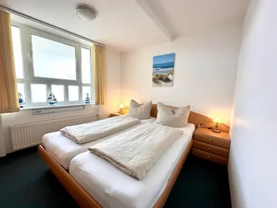 Ein Bett oder Betten in einem Zimmer der Unterkunft Ferienwohnung De Snieder