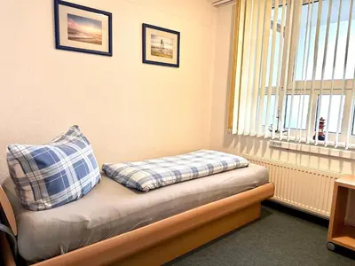 Ein Sitzbereich in der Unterkunft Ferienwohnung De Snieder