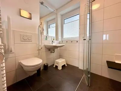 Ein Badezimmer in der Unterkunft Ferienwohnung de Gleemfisk