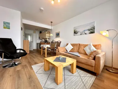 Ein Sitzbereich in der Unterkunft Ferienwohnung De Grasviol