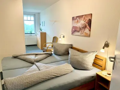 Ein Sitzbereich in der Unterkunft Ferienwohnung De Grasviol