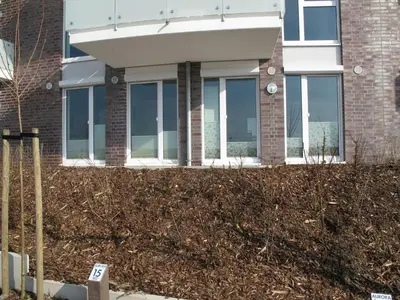 Ein Garten an der Unterkunft Ferienwohnung De Haagebutten
