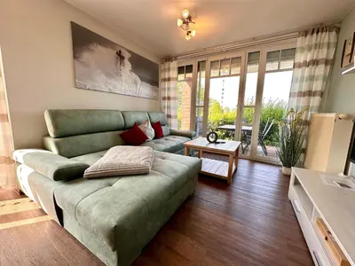Ein Sitzbereich in der Unterkunft Ferienwohnung de Drift