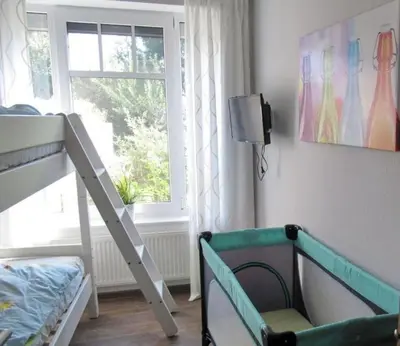 Ein Bett oder Betten in einem Zimmer der Unterkunft Ferienwohnung de Drift