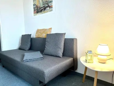 Ein Sitzbereich in der Unterkunft Ferienwohnung De Priel