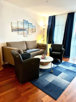 Ein Sitzbereich in der Unterkunft Ferienwohnung De Tied 106