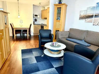 Ein Sitzbereich in der Unterkunft Ferienwohnung De Tied 106