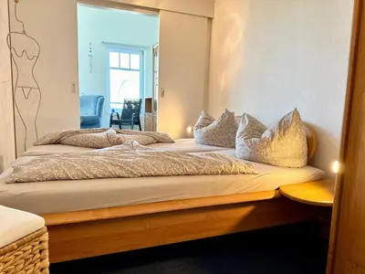 Ein Bett oder Betten in einem Zimmer der Unterkunft Ferienwohnung De Düker